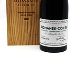 an image of a bottle of wine in front of a wooden box