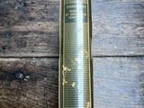 a book that is sitting on a wooden table