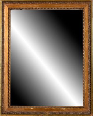 a gold framed mirror with a black background