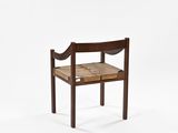 a wooden chair with a seat made out of wood and rope