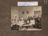 an old photo of a group of people in a hospital room