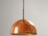 a wooden pendant light hanging from a ceiling