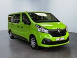the bright green van is parked in a large room