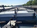 a boat that is sitting on the water in the water