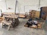 several pieces of wood are stacked on top of pallets in a warehouse