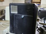 a microwave sitting on top of a table in a room