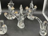 a glass candle holder that is sitting on a table
