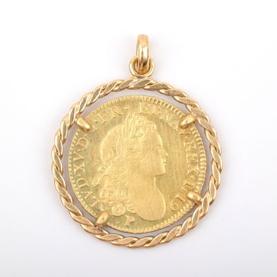 l'image d'une pièce d'or sur laquelle figure le visage d'une femme