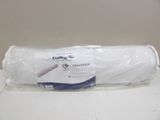 a roll of toilet paper wrapped in plastic on a counter