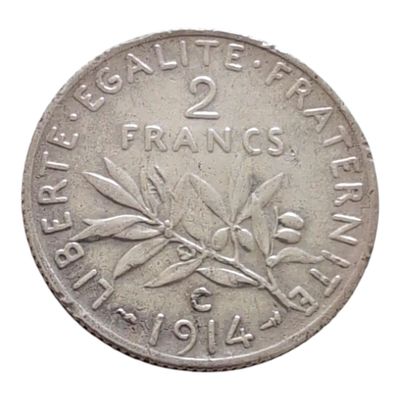 une image représentant une pièce d'argent sur laquelle figure une branche d'olivier