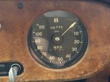a close up of a speedometer in a car