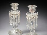 pair of cut glass candlesticks with crystal decoration
