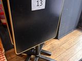 a table with a number on it and a chair in front of it
