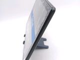 a close up of a cell phone on a stand