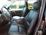 a picture of the interior of a car with leather seats