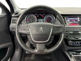 the interior of a car with a steering wheel and dashboard controls