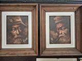 two framed pictures of a man with a hat and a pipe smoking a pipe