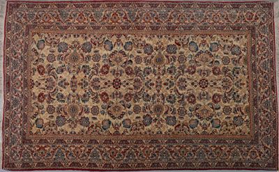 tapis persan ancien à motif floral sur fond beige