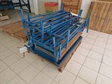 a pile of pallets sitting on the floor in a room