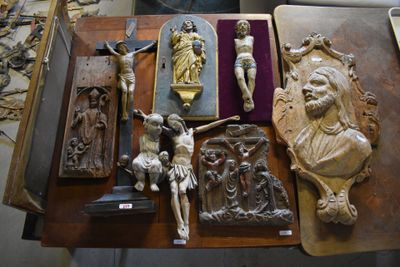 a table with a lot of religious items on it