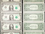 six billets d'un dollar verts et blancs sur fond noir