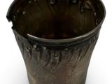 an image of a metal cup on a white background