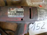 a drill that is sitting on a table with a price tag