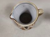 a small cup that is sitting on a table