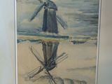 tableau représentant un homme debout sur une plage, avec un moulin à vent en arrière-plan