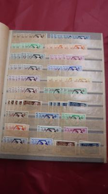 a book with stamps on it sitting on a table