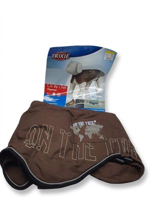 un gros plan sur une serviette sur laquelle figure un chien