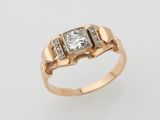 a gold and diamond ring
