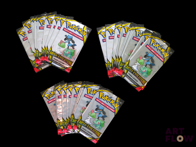 six packs of pokemon trading cards on a black background