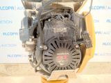 a close up of a small engine on a stand
