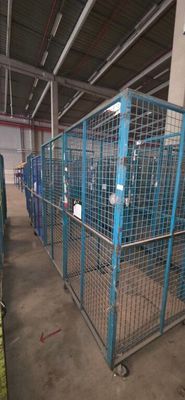 many cages in the building that are being used for animals