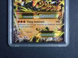 a close up of a pokemon card in a plastic case
