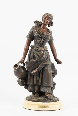 bronze statue of a woman holding a jug and a dog