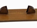 an image of a wooden bookend with two pieces of wood on it