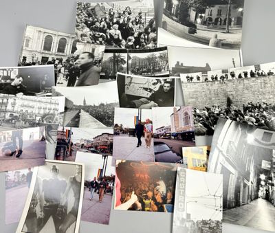 several black and white photos of a bunch of people on a street