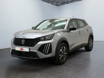 a silver suv parked in a white room with a black floor