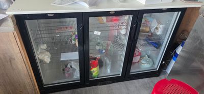 a refrigerator that has a lot of food inside of it