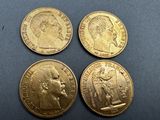 three gold sovereigns, one of which is a sovereign and the other of which is a sovereign