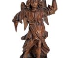 une image représentant une statue d'un ange tenant un oiseau