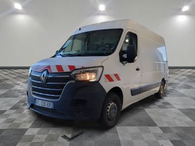a picture of a white van parked in a large room