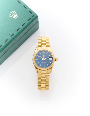 rolex a lady ' s 18ct gold automatic calendar wristwatch