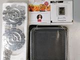 a box of food sitting on a table next to a pair of scissors