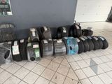a lot of tires that are on the floor