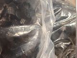a bag of chocolates wrapped in plastic on a table
