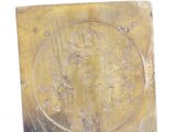a picture of a gold coin on a white surface