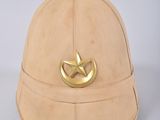 beige leather helmet with a gold buckle on the side